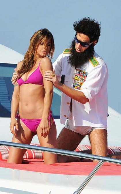 Sacha Baron Cohen Gives Elisabetta Canalis a Cannes Bikini Rubdown