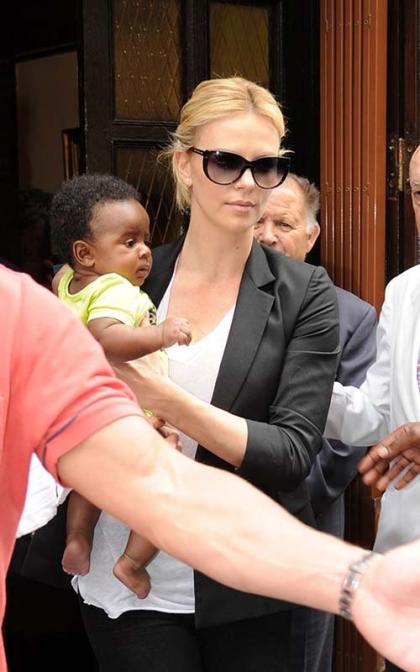 Charlize Theron Shows Off Jackson in Spain