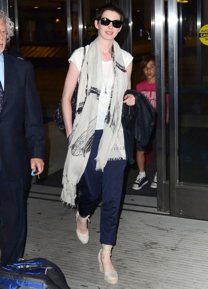 Anne Hathaway arrives in NYC as her ex-fiancé Raffaello Follieri is deported