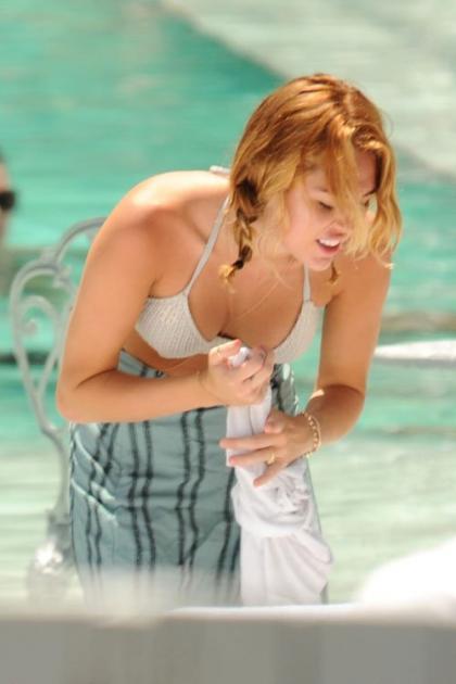 Miley Cyrus' Poolside Bikini Relaxation in the Sunshine State