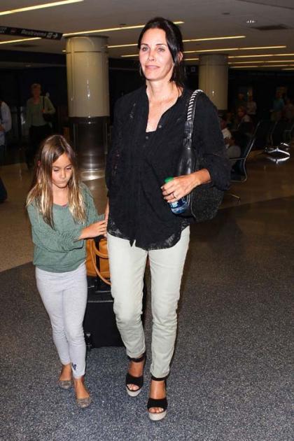 Courteney Cox & Coco Travel with 'Cougartown' Pal