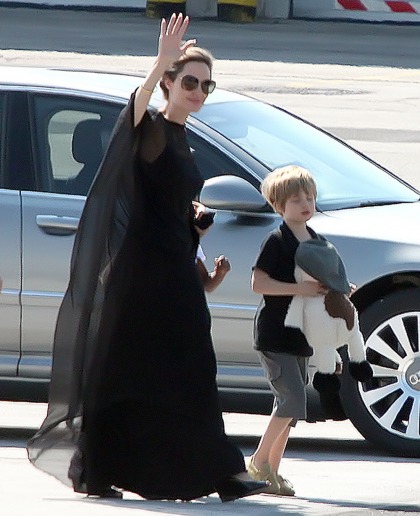Angelina Jolie arrives in Sarajevo in a stylish travel sack dress: goth-fug or cute?