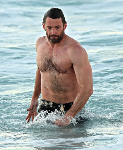Hugh Jackman shirtless on the beach: wet, beefy and bearded: would you hit it?