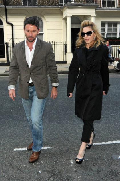 Madonna Leaves London Hotel with Mystery Man