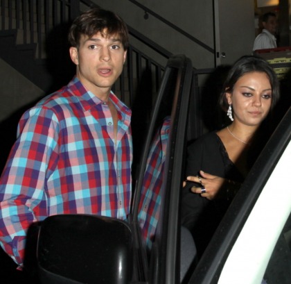 Mila Kunis doesn't care if you know she's with Ashton Kutcher now