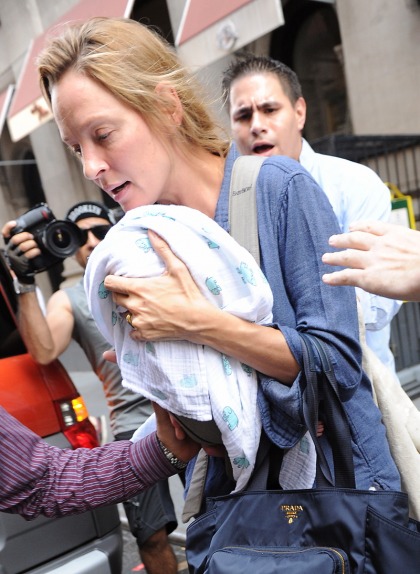 Uma Thurman steps out with her one-month-old baby girl & Prada baby bag