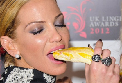 Sarah Harding Puts A Snake In Her Mouth