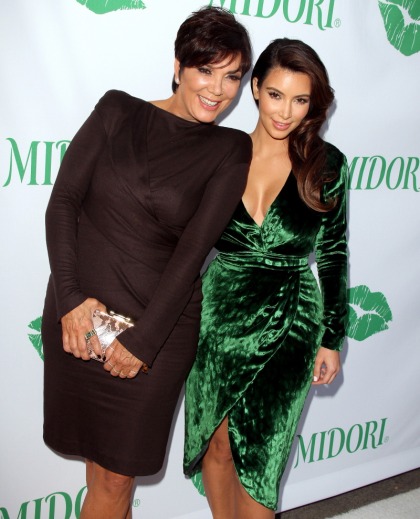 Kim Kardashian split her awful green velvet dress for Midori: hilarious & awful?