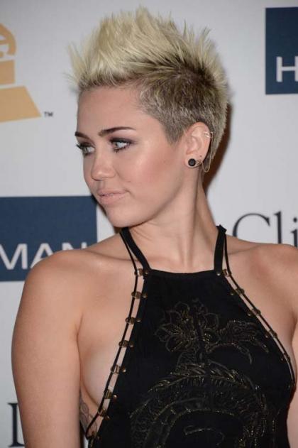 Miley Cyrus Flashes Skin at Clive Davis Pre-Grammy Gala