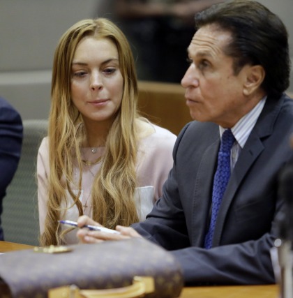 Lindsay Lohan's cracked-out 'branding manager' is her lawyer's son, Mike Heller