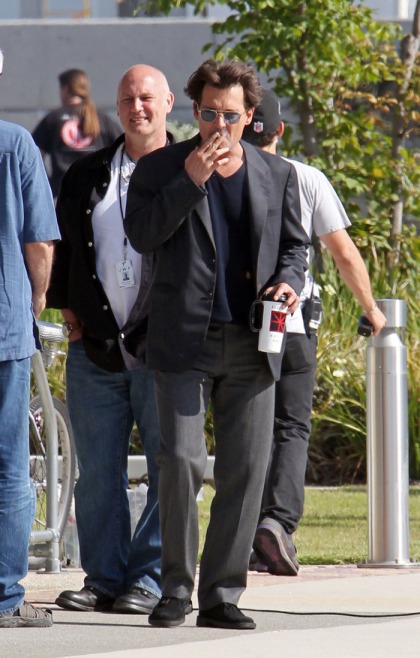 Johnny Depp looks clean cut on his latest movie set: would you hit it?