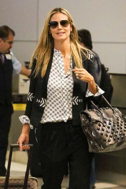 Heidi Klum Lands Back In LA After 