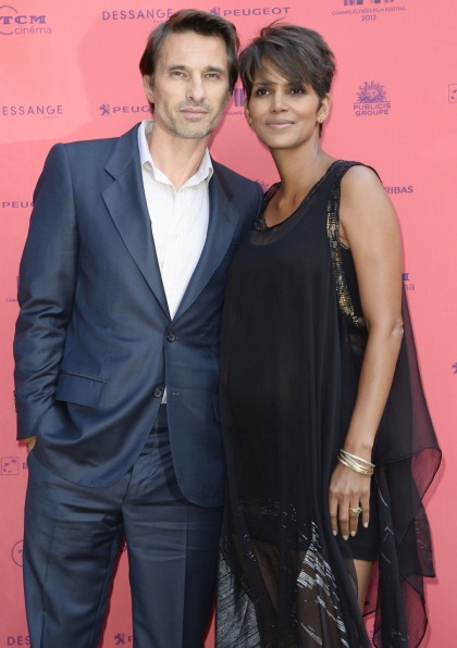 Halle Berry postpones her 'fairy-tale wedding' to Olivier until after she gives birth