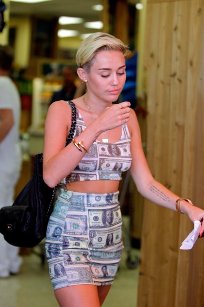 Miley Cyrus' dollar bill miniskirt & crazy GMA outfits: cool or trashy'