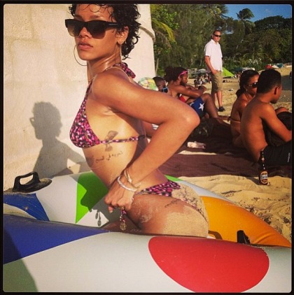 Rihanna is still on vacation in Barbados & posting a ton of bikini pics