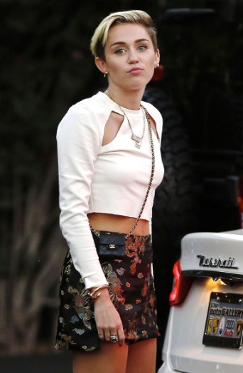 Miley Cyrus Amazing Legs in Mini Skirt in Studio City