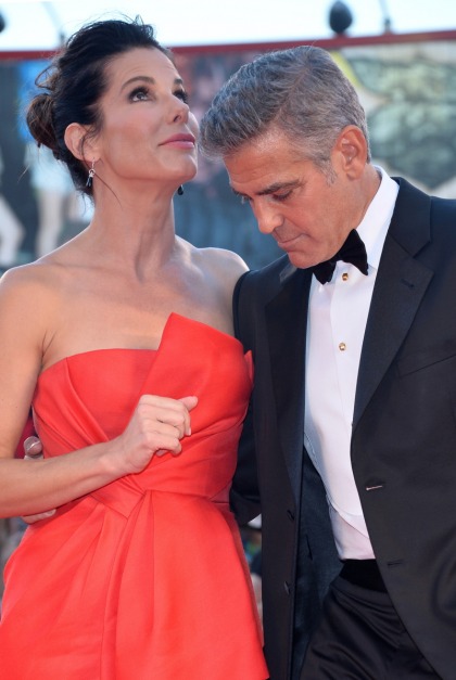 Sandra Bullock says her son Louis demands 'man time'   with his BFF George Clooney