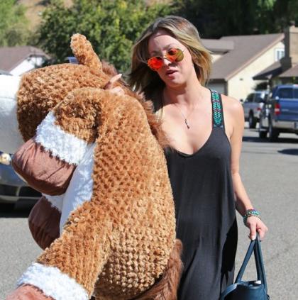 Kaley Cuoco Hides Behind a Giant Stuffed Animal While Out with Ryan Sweeting