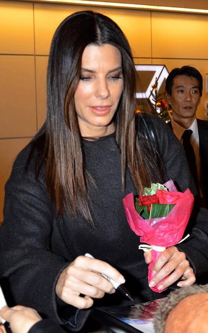 Sandra Bullock Lands in Tokyo