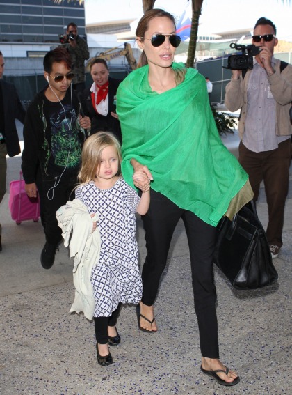 Angelina Jolie & Brad Pitt arrive back in LA with all six kids: did you miss them?