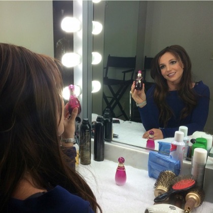Britney Spears goes brunette to promote her latest perfume: cute or mousy?