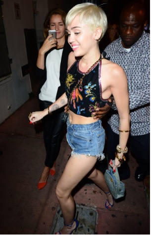 Miley Cyrus Celebrating at Cameo Nightclub in Miami