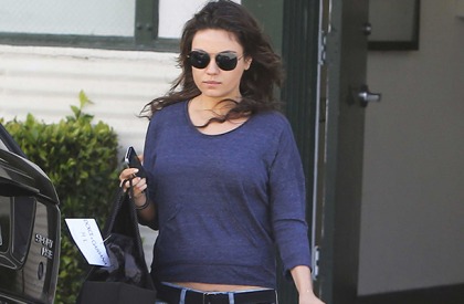 Mila Kunis' Sweater Mounds Are About To Get Bigger