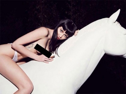 Miley Cyrus Went Topless on a Horse Statue