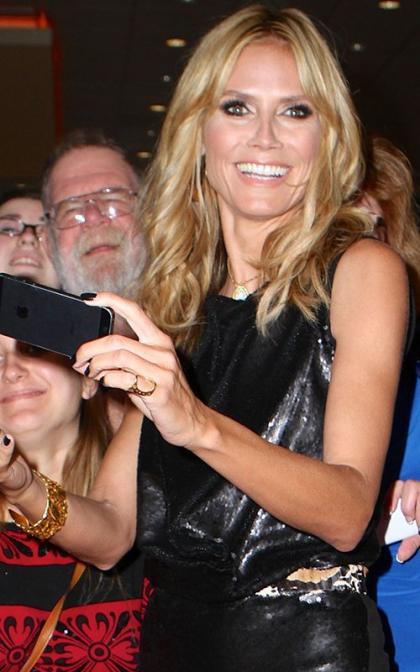 Heidi Klum Steps Out For The Season Premiere of 