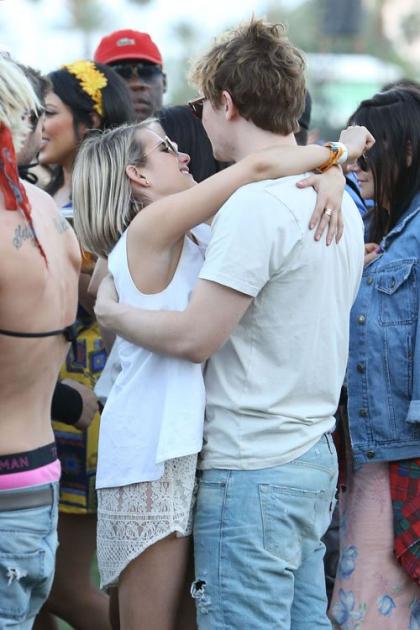 Emma Roberts and Evan Peters Kiss at Coachella