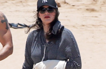 Kat Dennings Is Hiding Something At The Beach