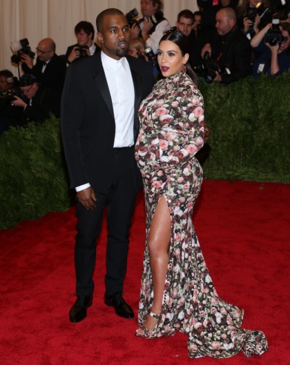 Kim Kardashian & Kanye West reportedly had a quiet wedding ceremony in LA
