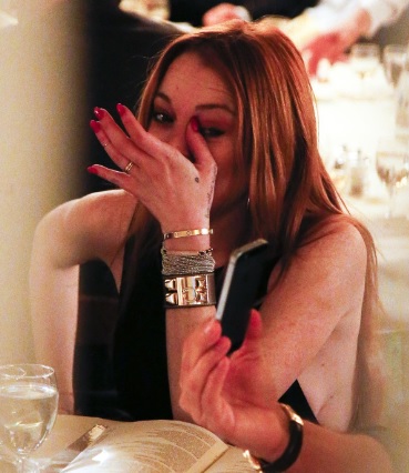 Lindsay Lohan Little Sideboob at a Restaurant in NY