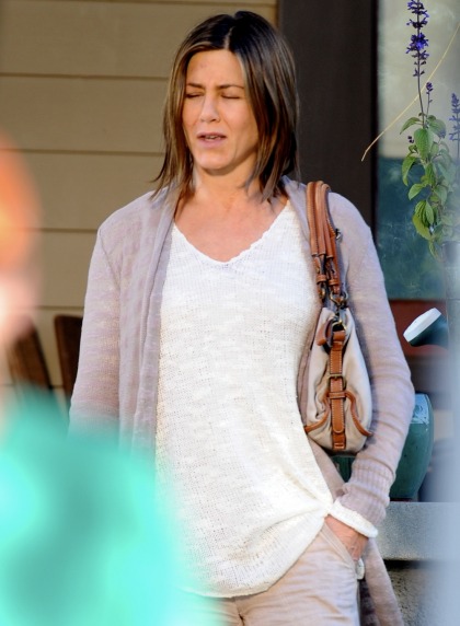 Jennifer Aniston 'actually likes' her dark bob: 'This is how God created me'