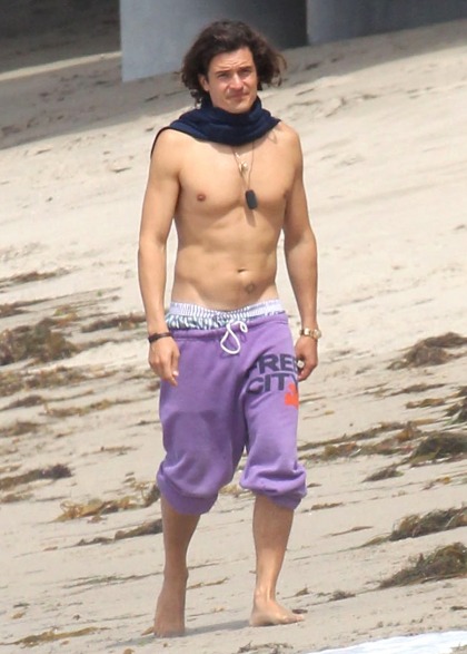 Orlando Bloom goes shirtless, wears lavender Free City sweats: would you hit it?