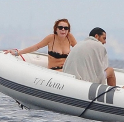 Lindsay Lohan Black Bikini in a Boat at Ischia