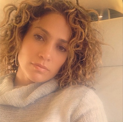 Jennifer Lopez shows off her 'naturally curly' hair in a new pic: vintage Fly Girl'