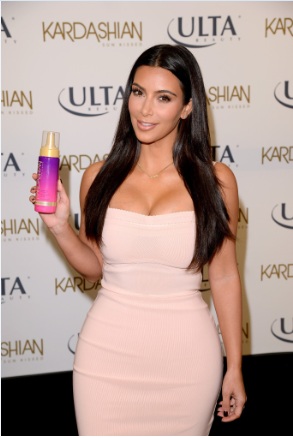 Kim Kardashian Bares Plenty of Cleavage at Sun Kissed Promo Event