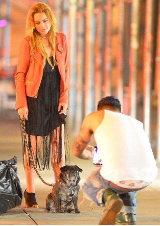 Lindsay Lohan With Male Pal During Night Out in the Hamptons