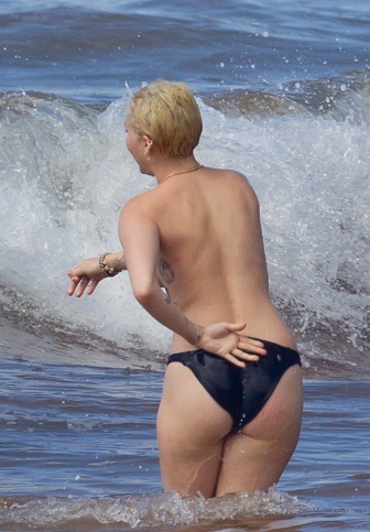 Miley Cyrus Completely Topless in Hawaii