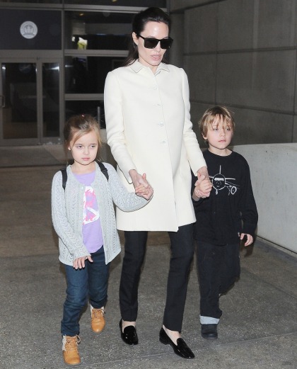 Angelina Jolie arrives at LAX with sleepy-looking Knox & Viv: adorable?