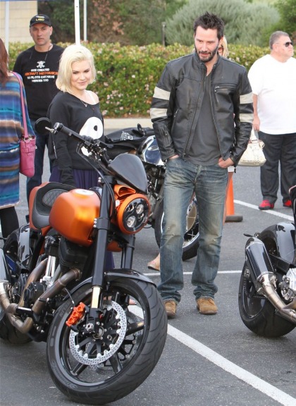 Keanu Reeves proudly shows his custom $78k motorcycles at classic car event