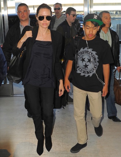 Angelina Jolie & Maddox fly to LA, meanwhile Brad is mysteriously bruised