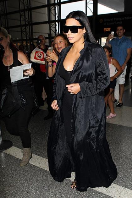 Kim Kardashian Lets Her Ladies Loose at LAX