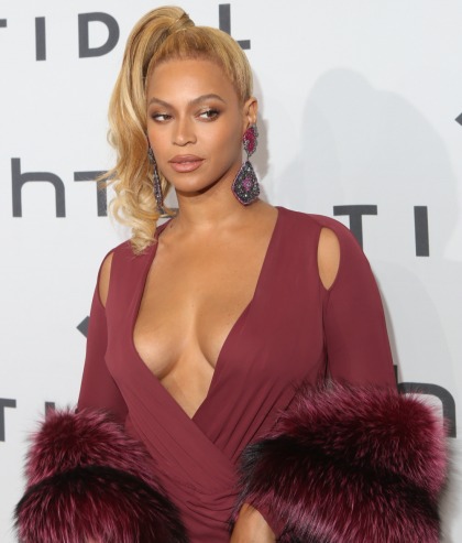 Beyonce to a handsy female assistant on the Tidal red carpet: 'stop it.'