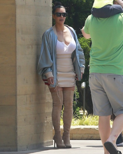 Kim Kardashian wore beige thigh-high suede boots: unflattering or fine?