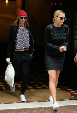 Margot Robbie & Cara Delevingne Braless Leave Hotel Together After Suicide Squad Premiere