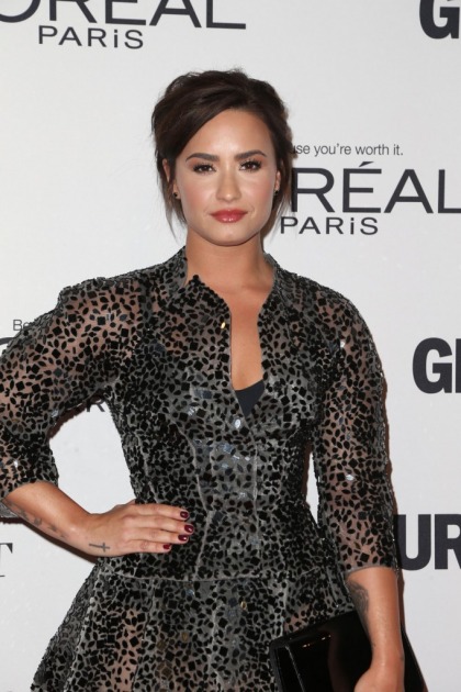 Demi Lovato's trainer: she's in the gym four hours a day, six days a week