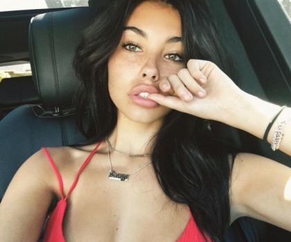 Madison Beer Does The Thumb On Lips Pose