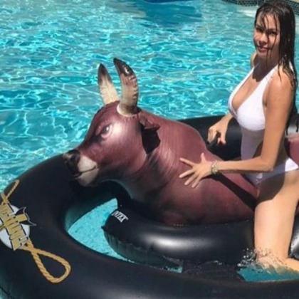 Sofia Vergara Rides A Bull In The Water